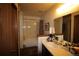 Bathroom with vanity and shower/tub combo at 10238 Quivas St, Thornton, CO 80260