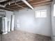 Unfinished basement with water heater and laundry hookups at 14314 E Hawaii Cir # D, Aurora, CO 80012