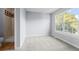 Bright bedroom with large window and view, and adjacent bathroom at 14314 E Hawaii Cir # D, Aurora, CO 80012