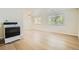 Cozy kitchenette with white cabinets and modern appliances at 7902 Meade St # C10, Westminster, CO 80030