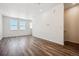 Bonus room with wood-style flooring, white walls, and recessed lighting at 6940 Merseyside Ln, Castle Pines, CO 80108