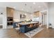 Modern kitchen featuring double ovens, a large island, and ample counter space at 1196 Lost Elk Loop, Castle Rock, CO 80108