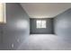 Large bedroom featuring gray walls and carpet at 3462 S Eagle St # 201, Aurora, CO 80014