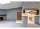 Kitchen with wood cabinets and white appliances at 3462 S Eagle St # 201, Aurora, CO 80014