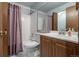 Clean bathroom with a shower/tub combo, toilet, and vanity at 3462 S Eagle St # 201, Aurora, CO 80014