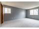 Spacious bedroom with gray walls and carpet flooring at 3462 S Eagle St # 201, Aurora, CO 80014