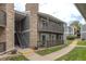 Exterior view of building with walkway and stairs at 3462 S Eagle St # 201, Aurora, CO 80014