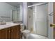 Bathroom with shower/tub combo and wood vanity at 3462 S Eagle St # 201, Aurora, CO 80014