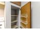 Kitchen pantry with wire shelving and additional storage at 3462 S Eagle St # 201, Aurora, CO 80014