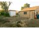 Backyard with detached garage and shed at 7261 Magnolia St, Commerce City, CO 80022