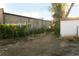 Backyard with shed and view of neighboring building at 7261 Magnolia St, Commerce City, CO 80022