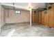 Unfinished basement area with exposed walls and concrete floor at 7261 Magnolia St, Commerce City, CO 80022