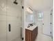 Clean bathroom, featuring a walk-in shower and double vanity at 261 Lafayette St, Louisville, CO 80027