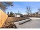 Backyard with detached garage and expansive yard space at 1882 S Alcott St, Denver, CO 80219