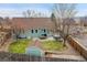 Backyard view with patio, hot tub, and storage shed at 13724 W Amherst Way, Lakewood, CO 80228