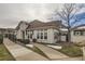 Attractive exterior of a ranch style home with a landscaped front yard at 9806 W Hinsdale Pl, Littleton, CO 80128