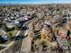 Aerial view of house near lake and neighborhood at 13089 Alcott Pl, Broomfield, CO 80020