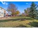 Spacious backyard with patio and mature trees at 13089 Alcott Pl, Broomfield, CO 80020