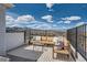 Relaxing rooftop deck with comfortable seating, offering stunning mountain views at 9649 Browns Peak Cir, Littleton, CO 80125