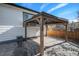 Covered patio area with gazebo, providing shade and outdoor space at 7470 Blue Water Ln, Castle Rock, CO 80108