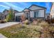 Ranch-style home with gray and white exterior at 7470 Blue Water Ln, Castle Rock, CO 80108