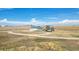 Ranch style home with attached garage on acreage at 43343 E Arkansas Pl, Bennett, CO 80102