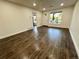 Open concept living room with hardwood floors and lots of natural light at 815 S Field St, Lakewood, CO 80226