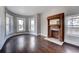 Living room features hardwood floors, fireplace and bay windows at 3028 Meade St, Denver, CO 80211