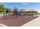 playground with swings, play structures, and shaded seating at 7723 S Cottonwood Mtn, Littleton, CO 80127