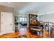 Upstairs hallway with piano, access to bedroom and large bookshelf at 21931 E Ridge Trail Cir, Aurora, CO 80016