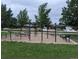 Community outdoor fitness area with various exercise equipment at 1050 S Raleigh St, Denver, CO 80219