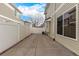 Concrete patio area and backyard with privacy fence at 19415 Robins Dr, Denver, CO 80249