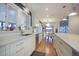 Open concept kitchen with a view into the dining area at 9650 Poundstone Pl, Greenwood Village, CO 80111