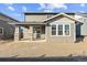 Two-story home with covered patio and spacious backyard at 3230 Boral Owl Dr, Brighton, CO 80601