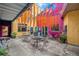 Colorful courtyard with patio seating, perfect for relaxing at 910 Santa Fe Dr # 19, Denver, CO 80204