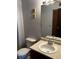 Simple bathroom with sink, toilet, and shower at 13261 E Asbury Dr # 202, Aurora, CO 80014
