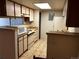 Galley kitchen with ample counter space and cabinets at 13261 E Asbury Dr # 202, Aurora, CO 80014