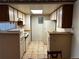 Efficient kitchen featuring ample cabinetry and appliances at 13261 E Asbury Dr # 202, Aurora, CO 80014