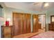 Bright bedroom with double door closet and ensuite access at 9350 Grandview Ave, Arvada, CO 80002