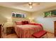 Spacious bedroom with hardwood floors and ceiling fan at 9350 Grandview Ave, Arvada, CO 80002