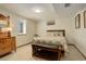 Basement bedroom with wood furniture and carpeted floor at 9350 Grandview Ave, Arvada, CO 80002