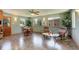 Sunlit breakfast nook with tile floor and built-in seating at 9350 Grandview Ave, Arvada, CO 80002