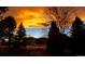 House at sunset, showcasing the property's curb appeal at 9350 Grandview Ave, Arvada, CO 80002