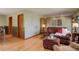 Bright living room with hardwood floors and a cozy seating area at 9350 Grandview Ave, Arvada, CO 80002