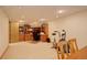 Finished basement with home office, exercise equipment, and storage at 9350 Grandview Ave, Arvada, CO 80002