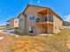 Two-story house with a deck and walkout basement at 1516 Piney Hill Pt, Monument, CO 80132