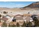 Aerial view of a community, showing the property's location and neighborhood context at 1516 Piney Hill Pt, Monument, CO 80132