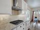 Bright kitchen features granite countertops, stainless steel appliances, and ample cabinetry at 1516 Piney Hill Pt, Monument, CO 80132