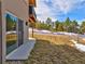 Landscaped backyard with patio and mountain views at 1516 Piney Hill Pt, Monument, CO 80132