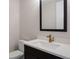 Simple bathroom with single vanity and updated faucet at 8015 Parnassus Pl, Castle Rock, CO 80108